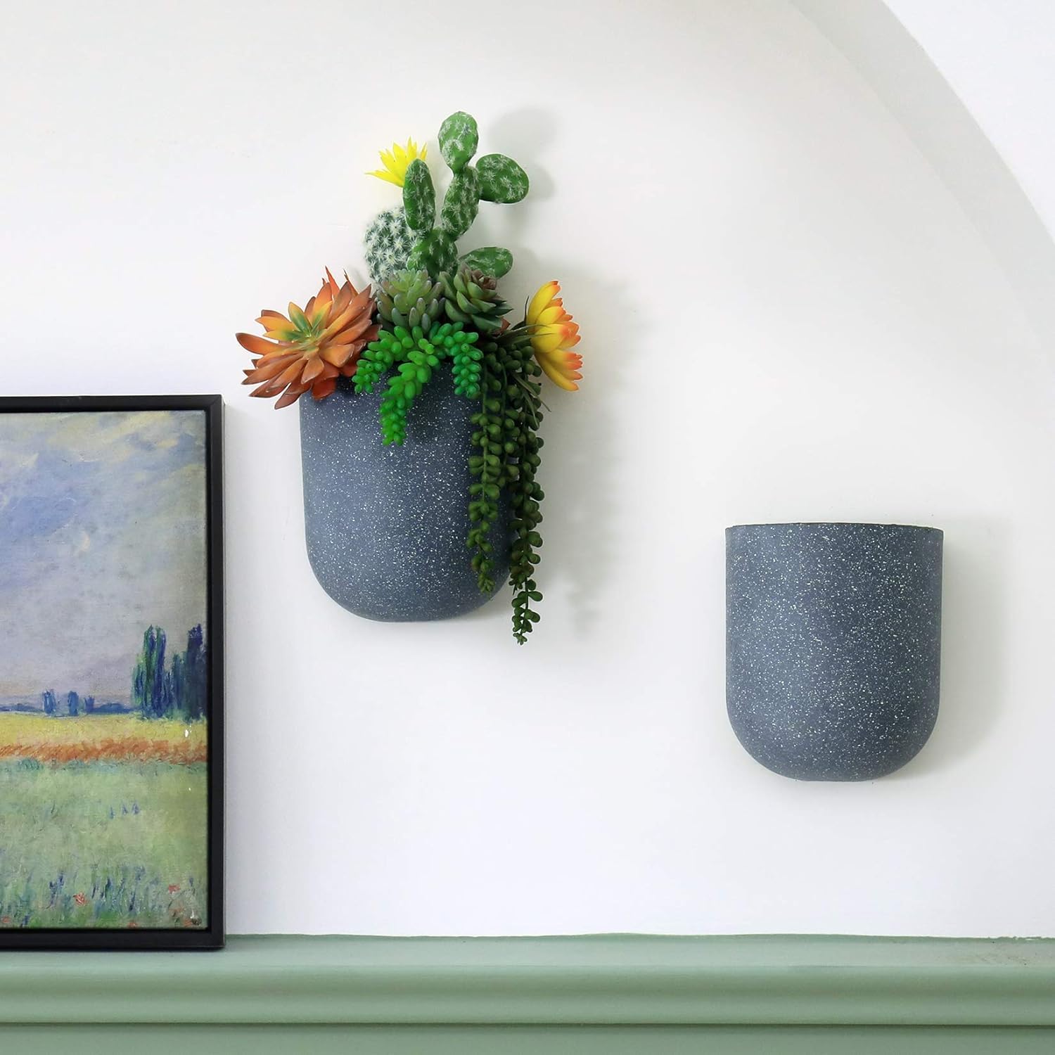 LA JOLIE MUSE weathered gray planter on indoor staircase display