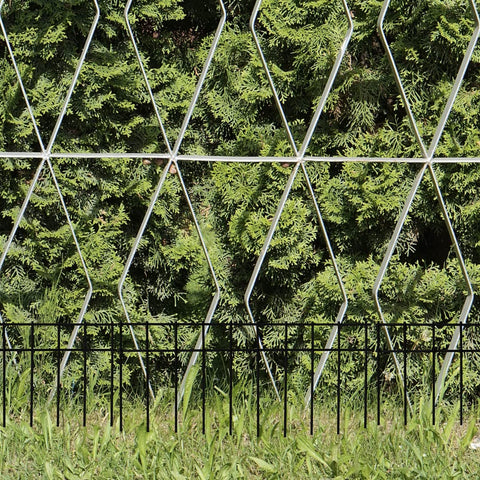 LADECH ground stakes border a garden bed for neat boundaries.