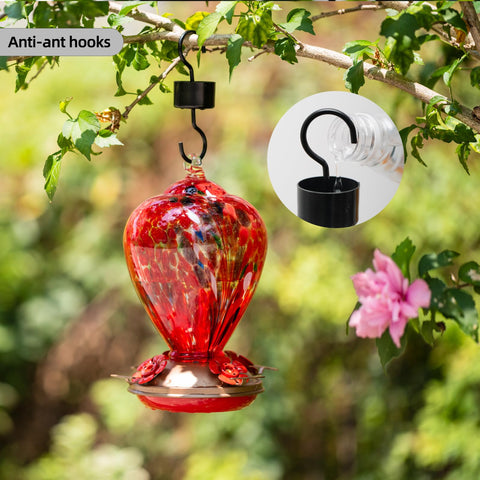 Hand-blown glass with bubbles adds artisanal charm to the feeder
