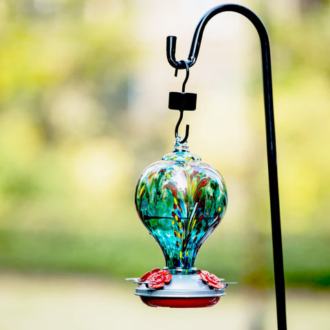 LaElvish Garden Hummingbird Feeder with safety ports reduces risk of tongue injuries during feeding.