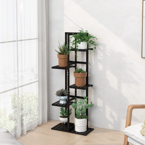Laiensia indoor-outdoor plant rack shown in a sunlit balcony corner.