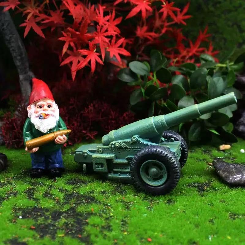 Lamnes funny garden gnome with cannonball for whimsical outdoor decor and smiles.