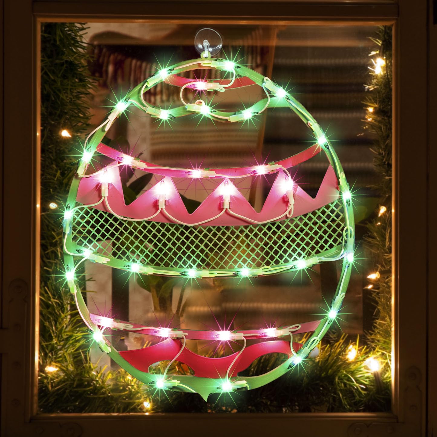 LAMPHOME Easter egg window silhouette in green with pink chevron for festive curb appeal.