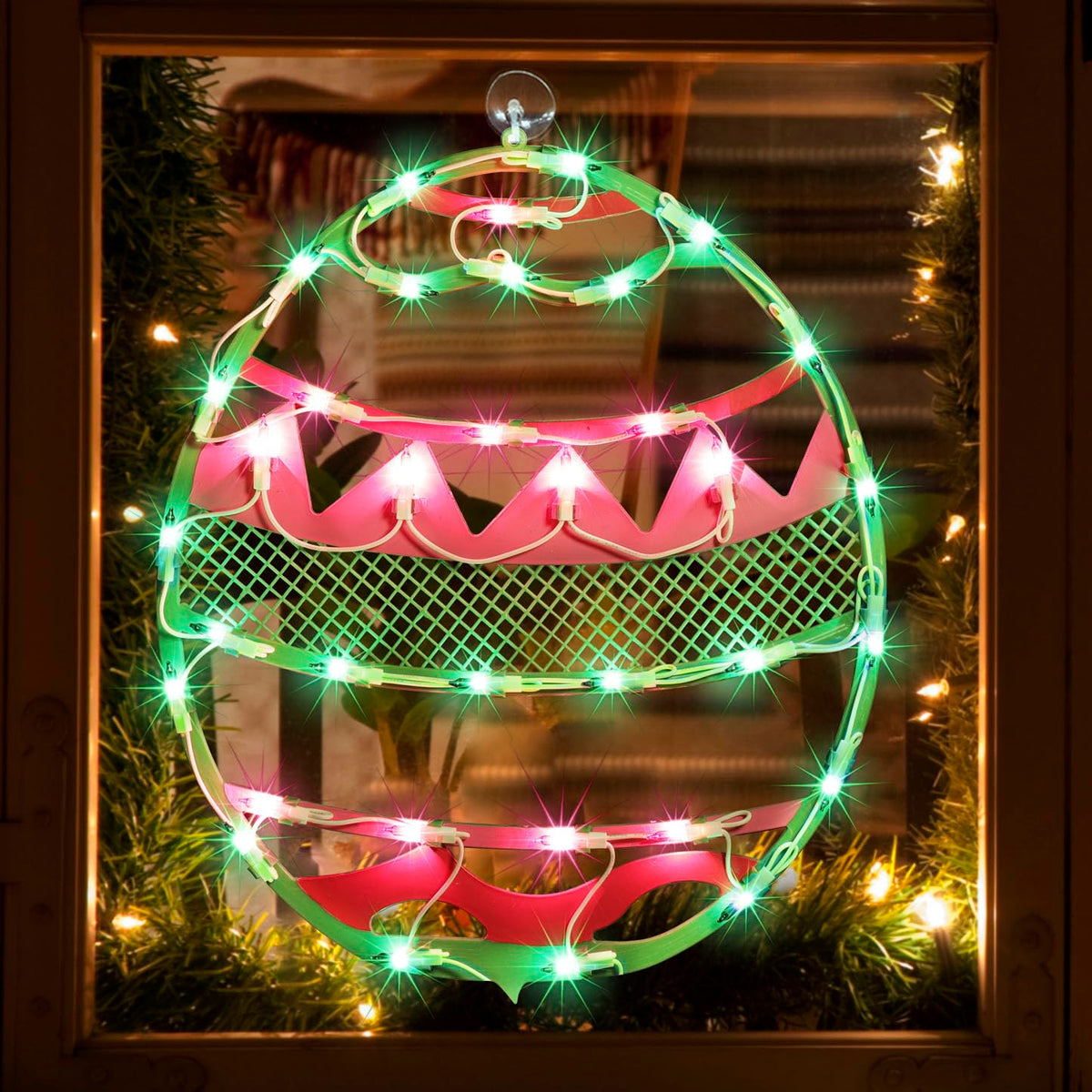 LAMPHOME Easter egg window silhouette in green with pink chevron for festive curb appeal.