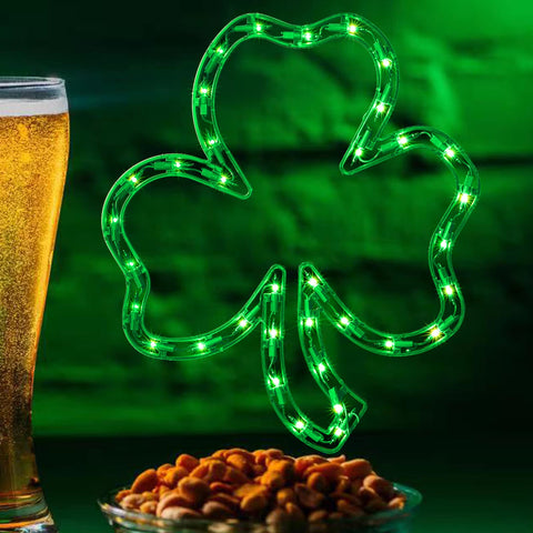 LAMPHOME shamrock window silhouette glows green for St. Patrick's Day decor.