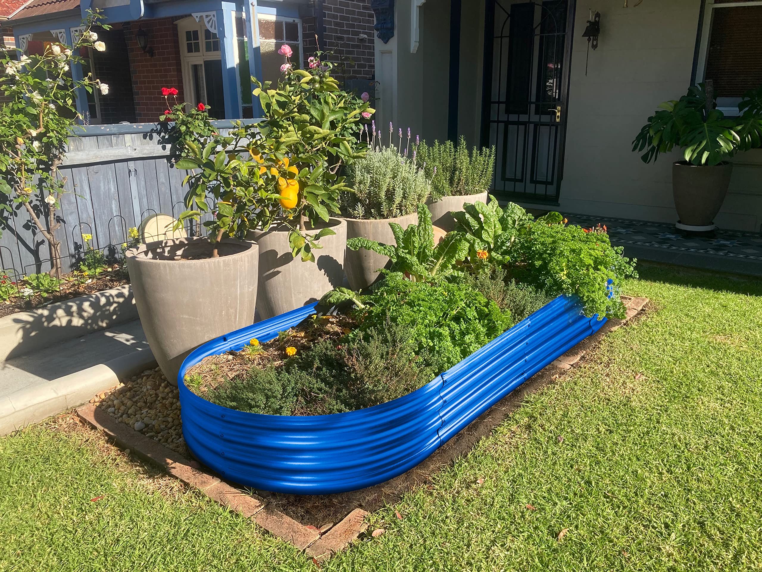 Land Guard blue thick-gauge metal raised garden bed durability