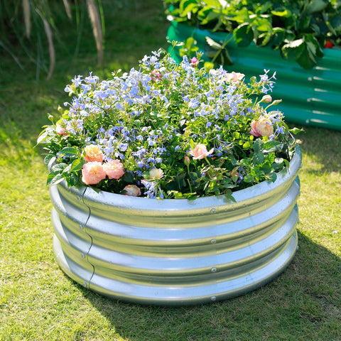 Land Guard galvanized bed open-base design showing drainage for healthy roots.