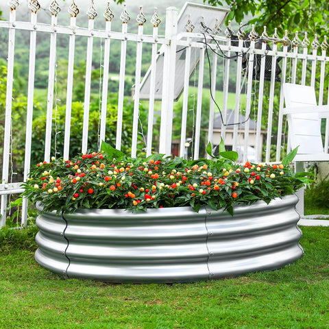 Land Guard outdoor round bed placed in yard ready for planting vegetables and herbs.