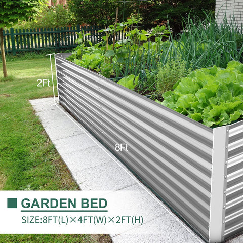 Land Guard vegetables thriving in spacious metal bed setup.