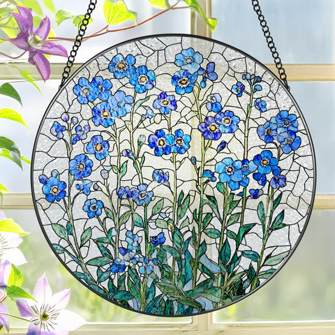 LAOWEIKI 8-inch stained glass window hanging featuring Forget Me Not bloom in sunlight