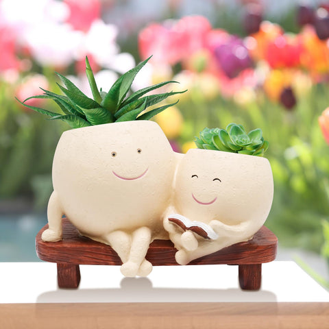 LAUGOKOBE Durable resin planter withstands sun and weather.
