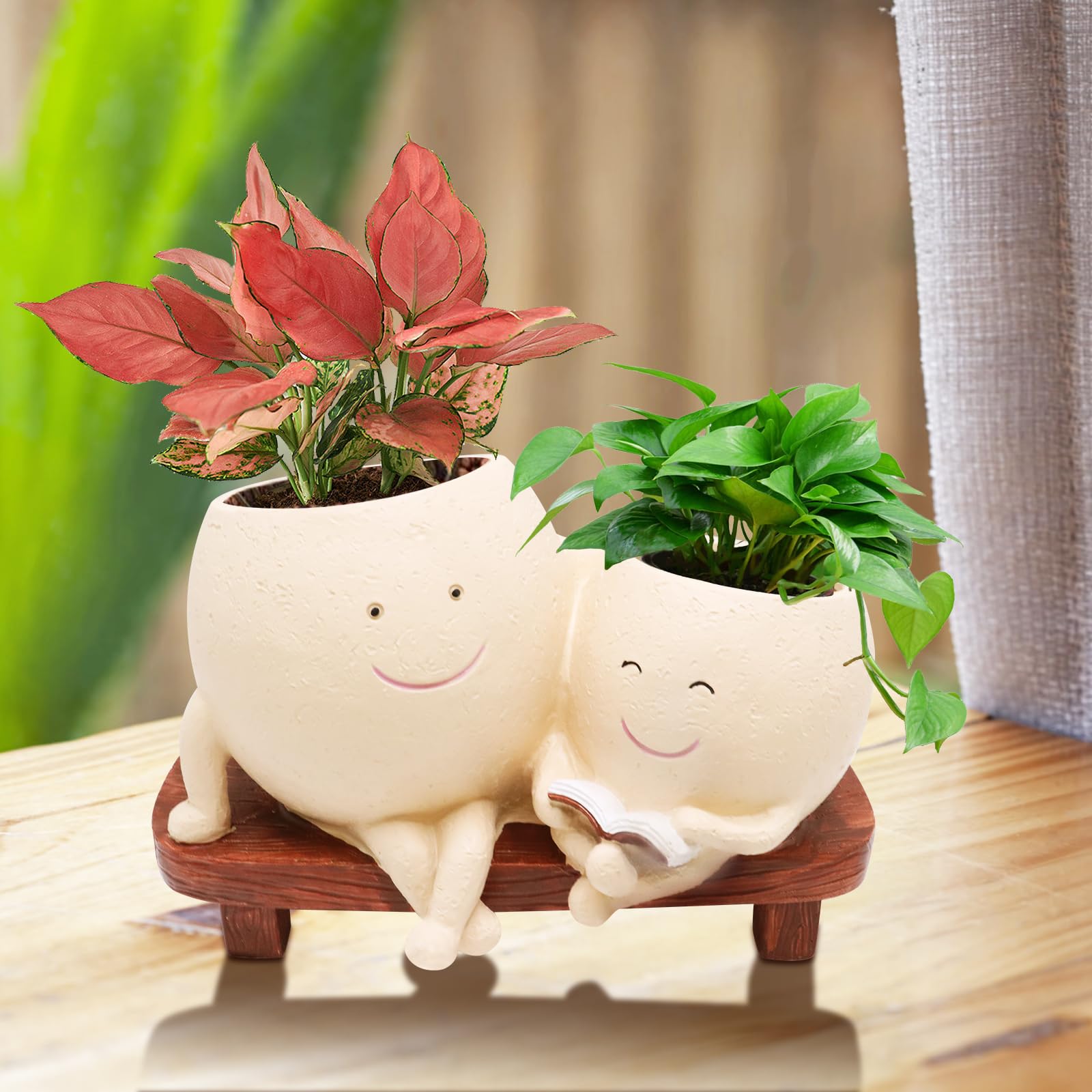 LAUGOKOBE Lady Head Vase Planter adds unique character to outdoor spaces.