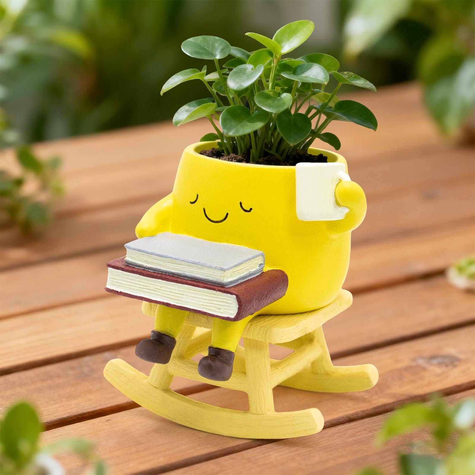 LAUGOKOBE planter with book and coffee mug for cozy spaces.