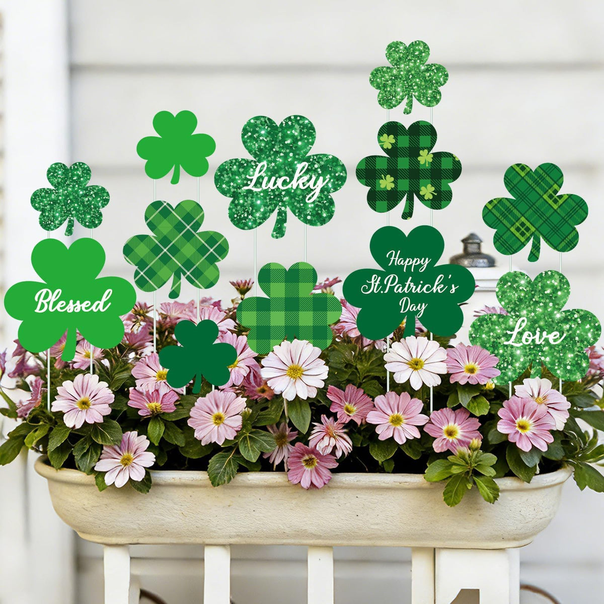 LawnIdyll planter stake shamrock display in a garden for festive decor