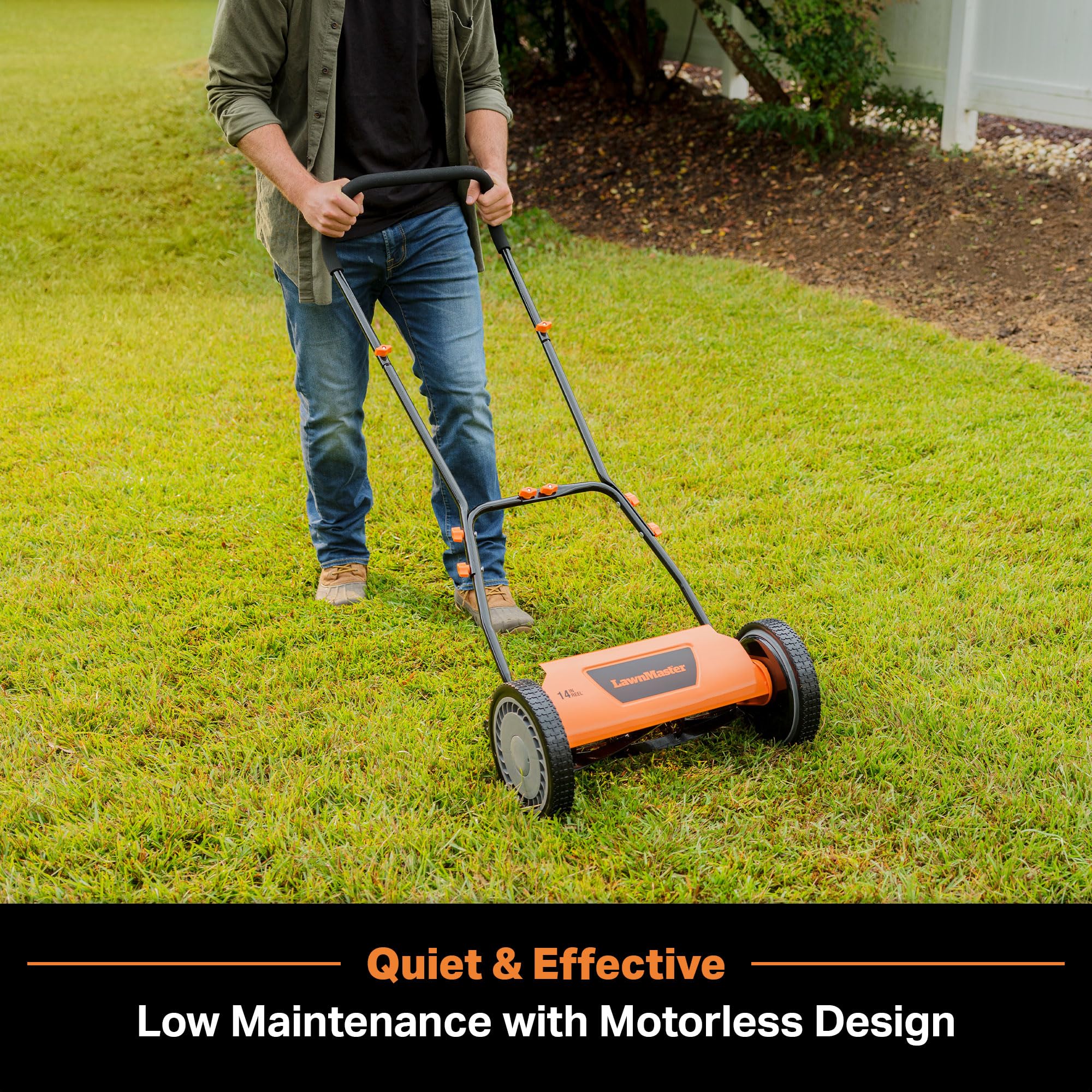 LawnMaster LMRM1401 in use on a small lawn with manual push.