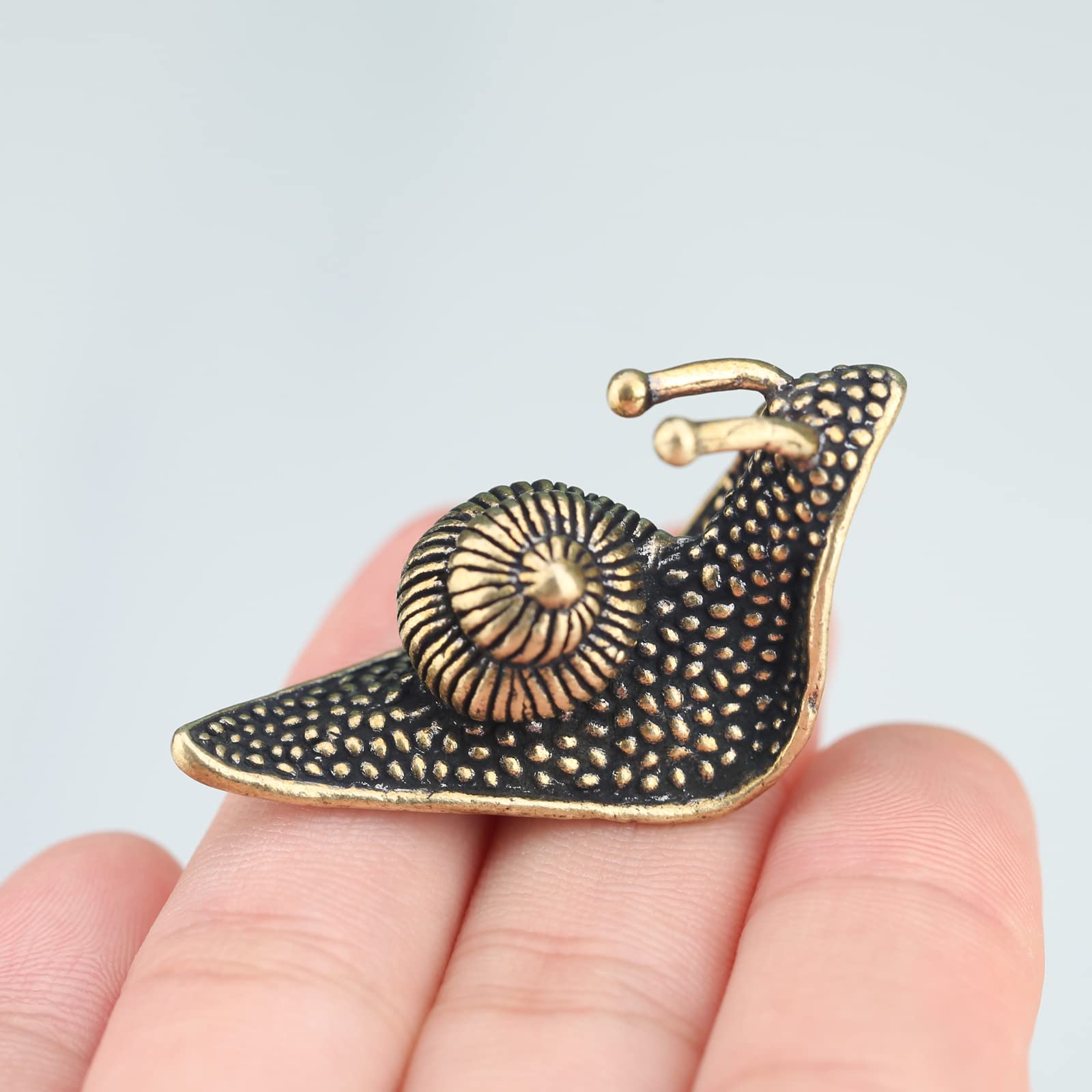 LCCCK brass snail figurine suited for terrariums, indoor gardens, and patio displays.