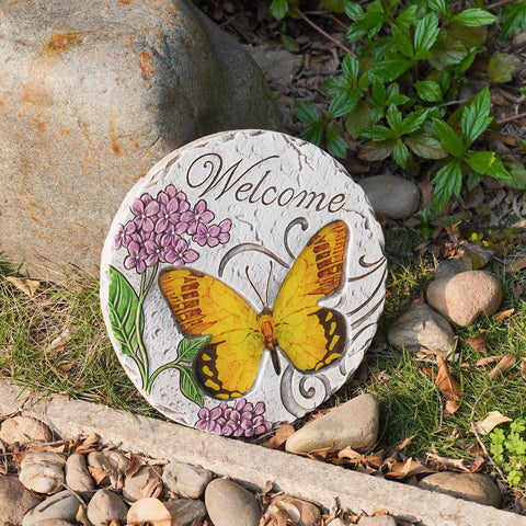 LCdecohome garden path stone with butterfly accents.
