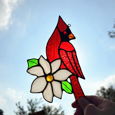 Lcensp closeup of vibrant red cardinal stained-glass detail