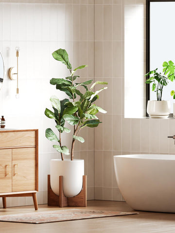 LE TAUCI ceramic white pot exterior highlights minimalist interior style.