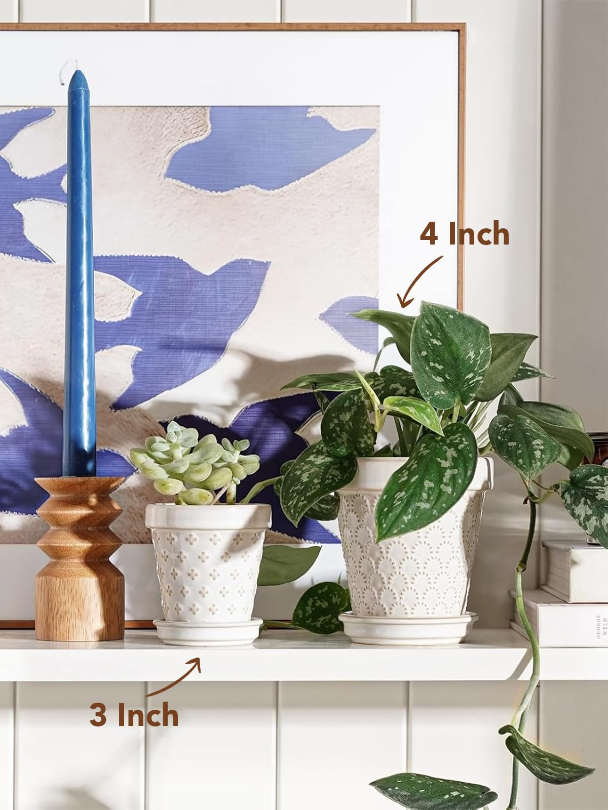 LE TAUCI embossed flower pattern on a tiny ceramic pot for decor.