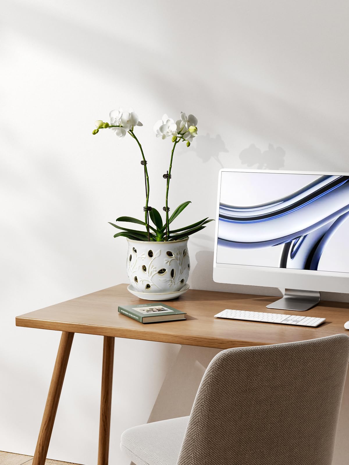 LE TAUCI ornate orchid pot featuring leaf perforations and vintage glaze.