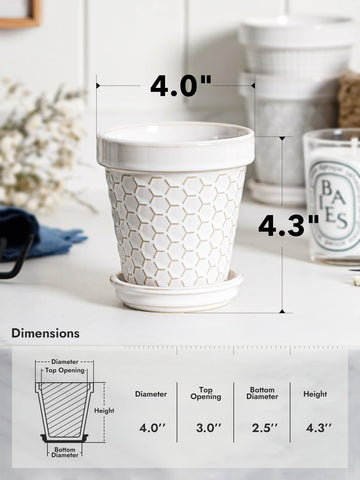 LE TAUCI pots feature drainage holes and a drip pan to protect surfaces
