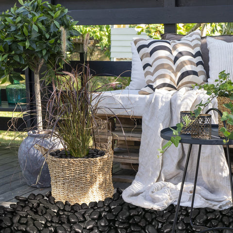 Lechloris smooth black pebbles add natural polish to interiors and exteriors