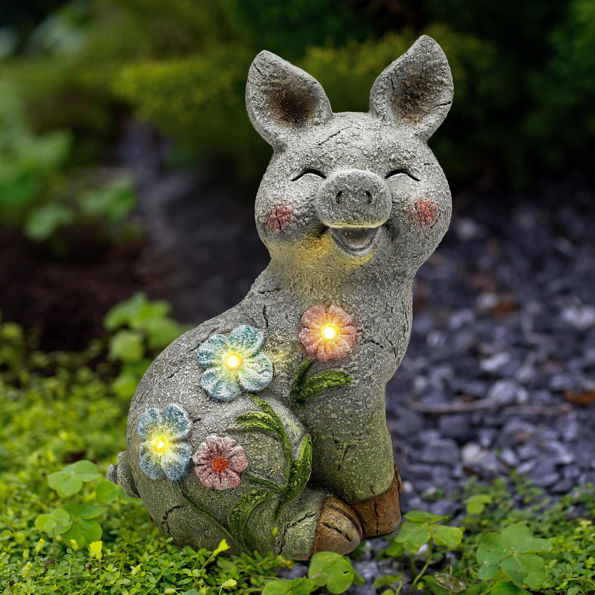 Leekung solar pig garden statue with LED lights brightening your patio at night.