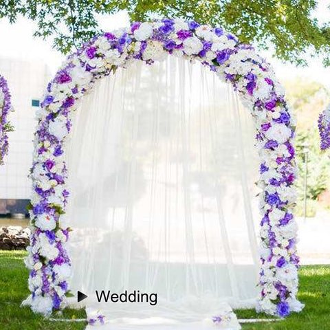 LeJoy Garden arch used as a wedding backdrop with natural framing.