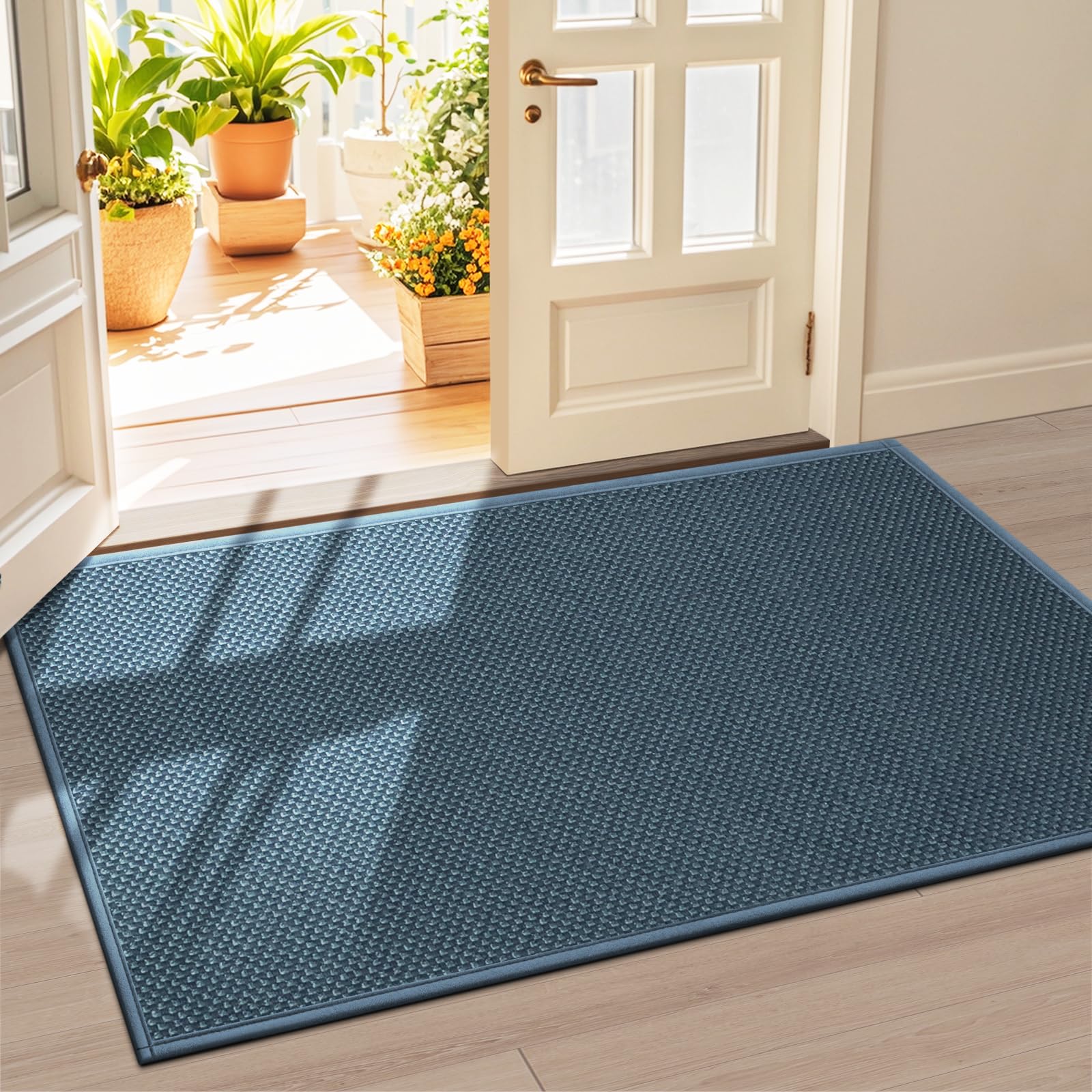 LEKEEPGO cyan blue door mat with absorbent surface keeps floors dry.