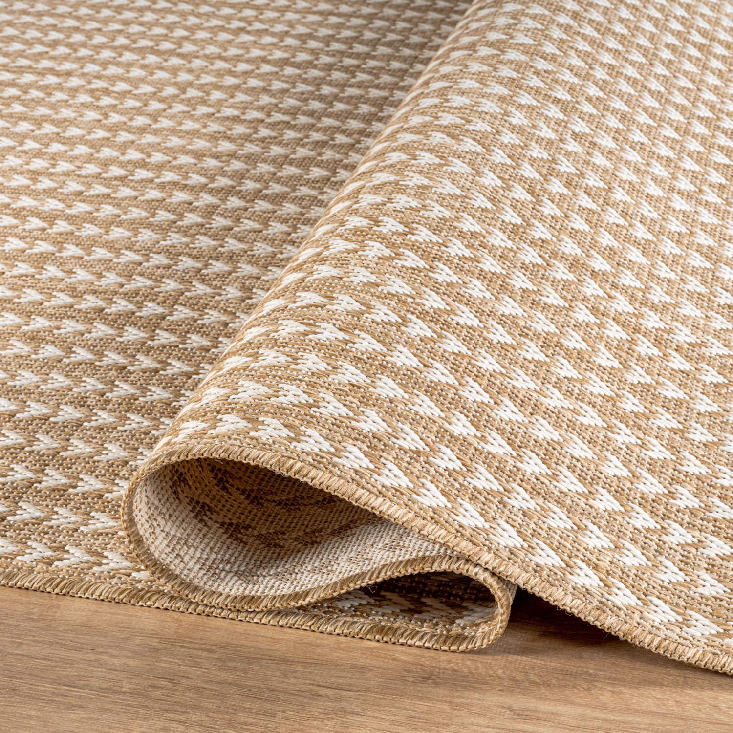 Lena Rug waterproof and UV resistant for sun and rain exposure.