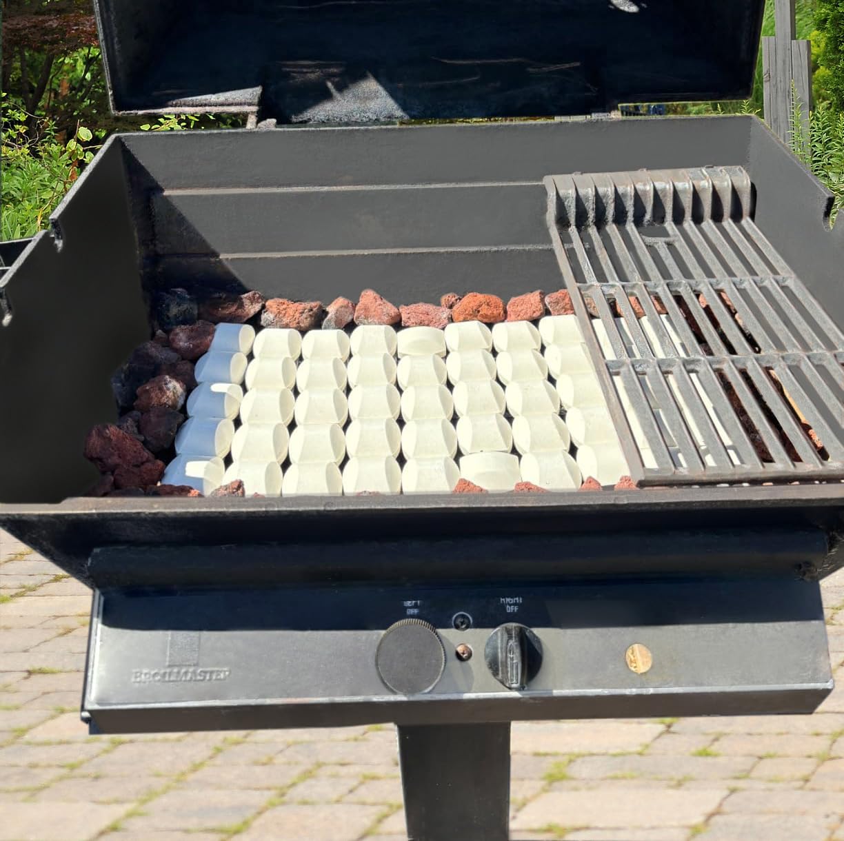 Leship briquettes absorb excess oil to reduce splatter and keep the grill cleaner