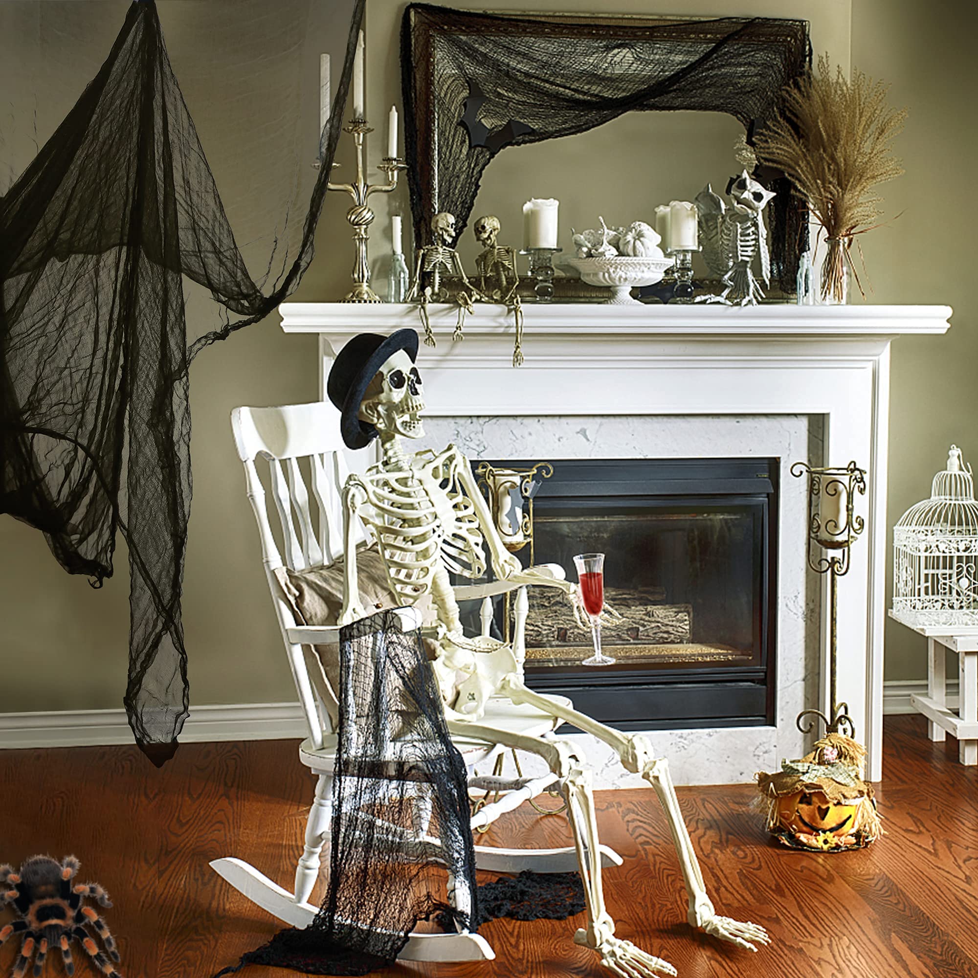 LessMo creepy cloth draped over furniture evokes haunted room vibes.