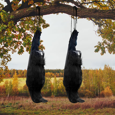 Lewtemi 17-inch hanging crow decoy with lifelike feathers for outdoor Halloween ambiance.