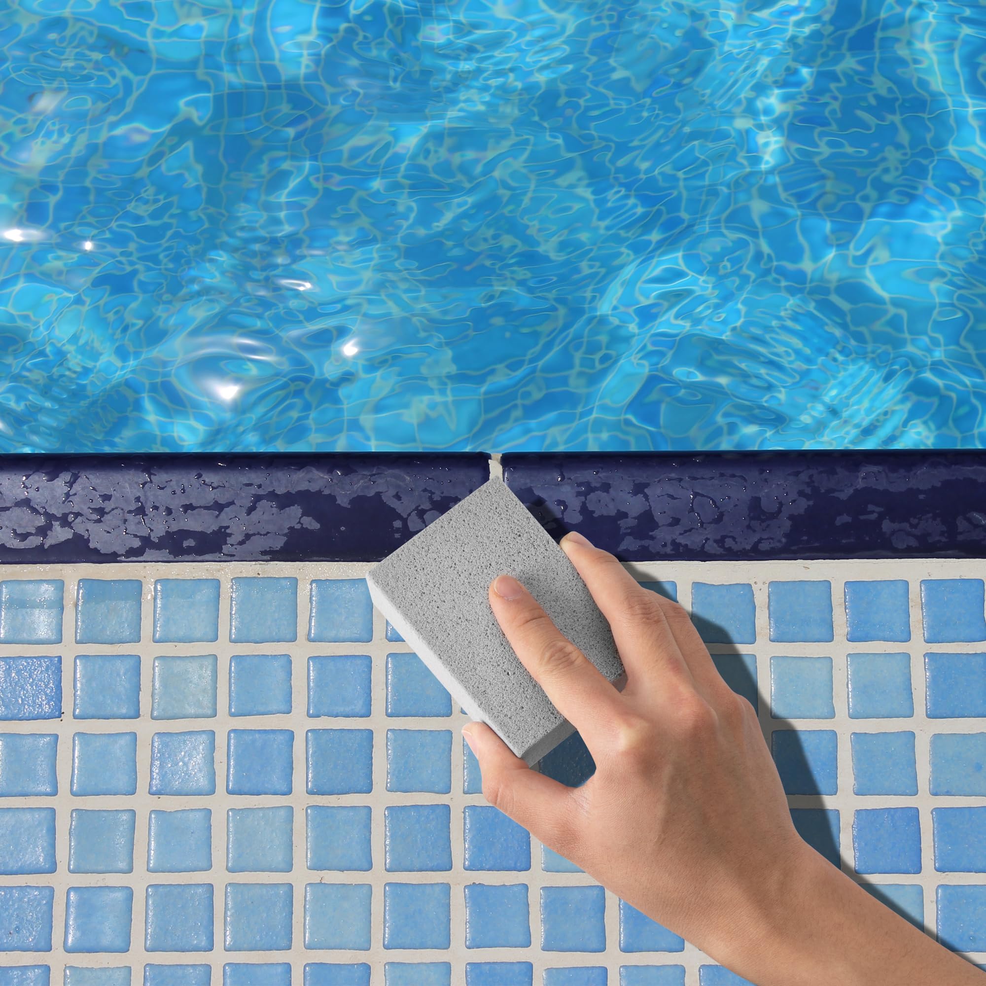 LFUTARI rust and hard water removal on pool tiles with pumice
