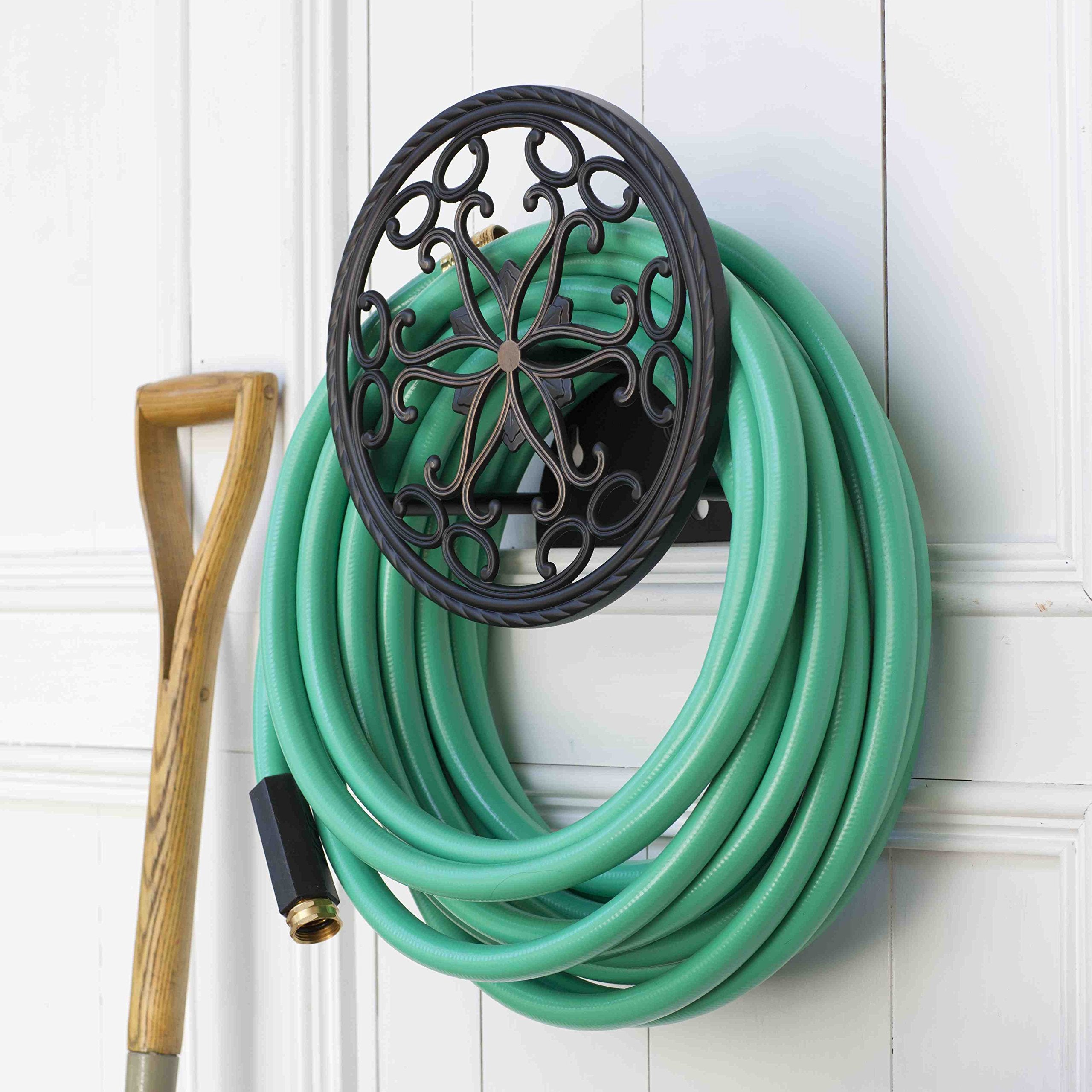 Liberty Garden 671 mounted on wall offering decorative and practical hose storage