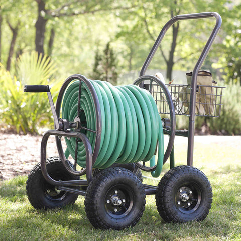 Liberty Garden hose reel cart with tool basket keeps pruning shears within reach.