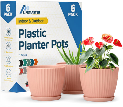 Lifemaster pink 6-inch plant pot with drainage holes for healthy roots.