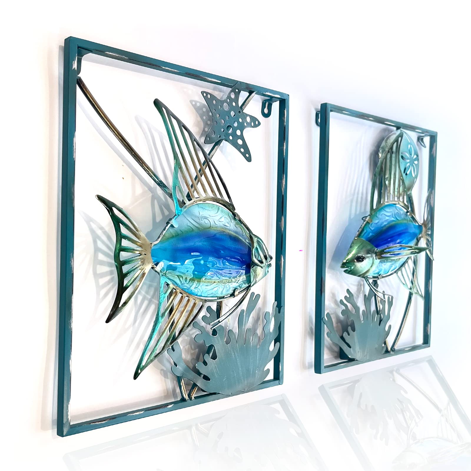 Liffy metal fish wall decor frame in blue, enhances outdoor ambiance.