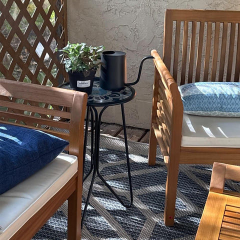 LIFFY end table with round glass top beside sofa or chair