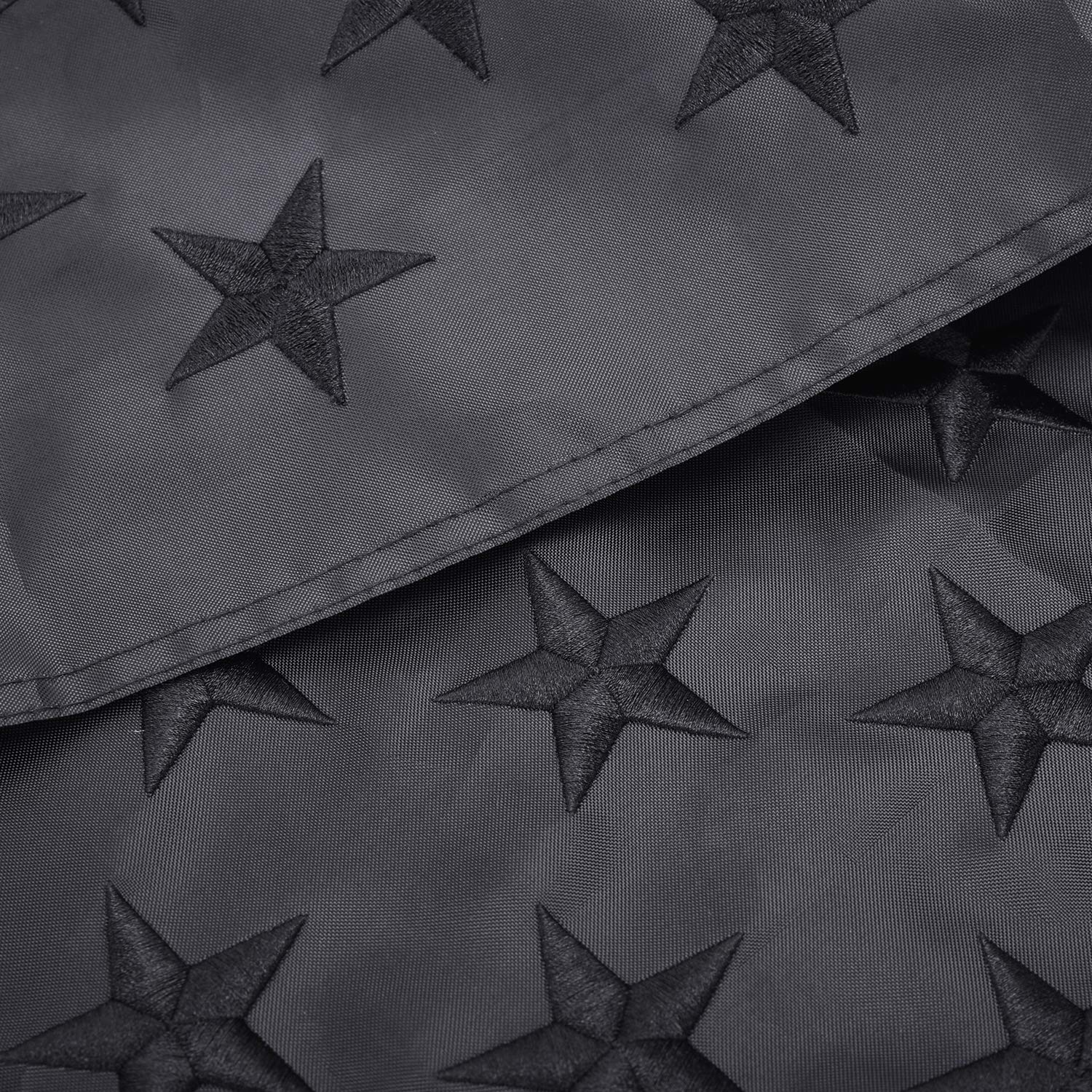 Lifraon flag with brass grommets secured to rugged header for strong mounting.
