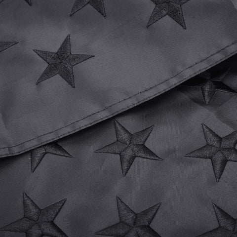 Lifraon flag with brass grommets secured to rugged header for strong mounting.