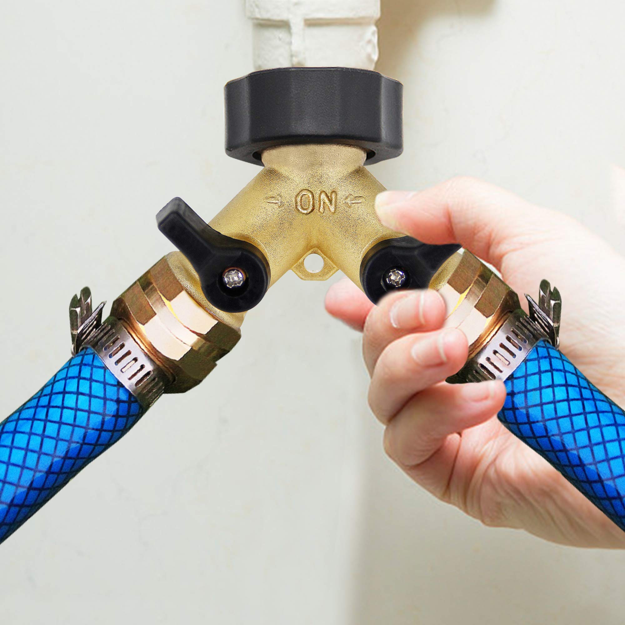Lifynste brass splitter installed on garden hose with two outlets active