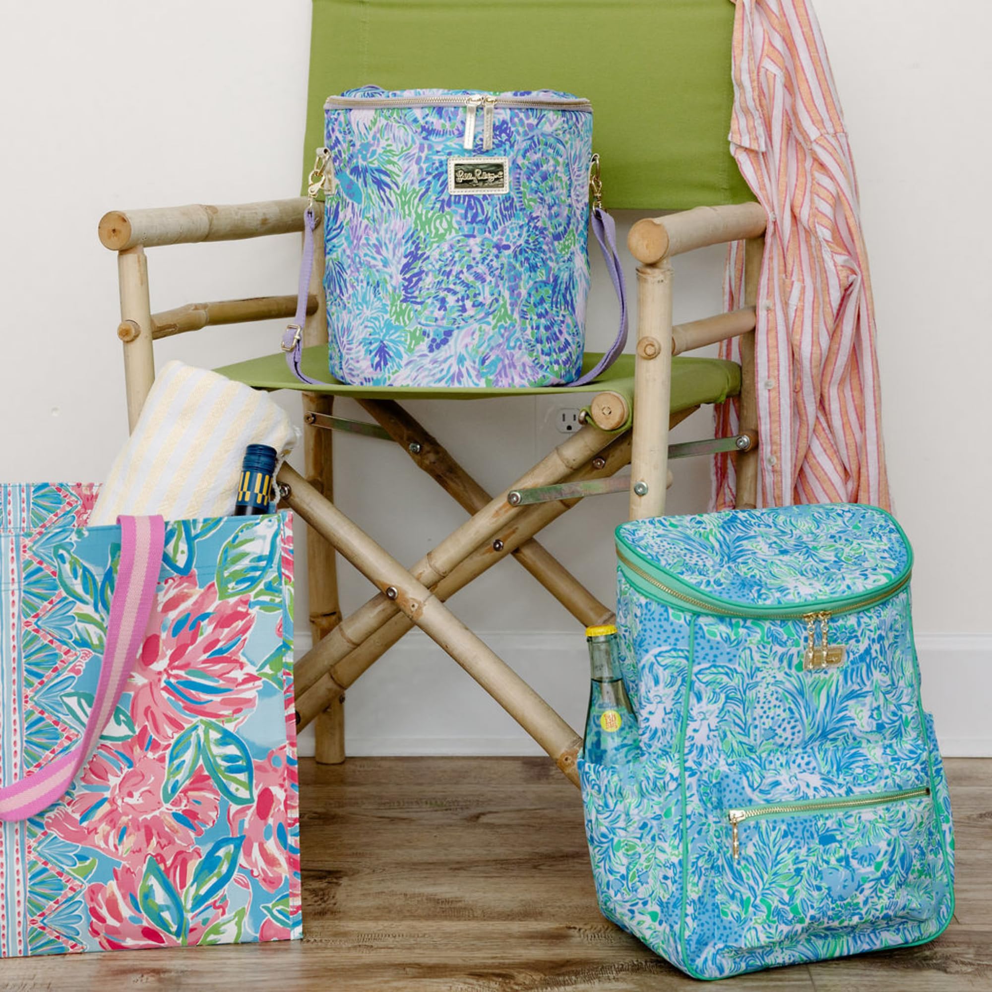 Lilly Pulitzer bottle upright with elastic holder keeps wine stable.