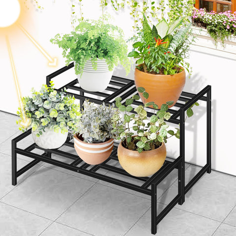 Lilybud lily plant stand 2-tier middle shelf supports larger plants securely for care.