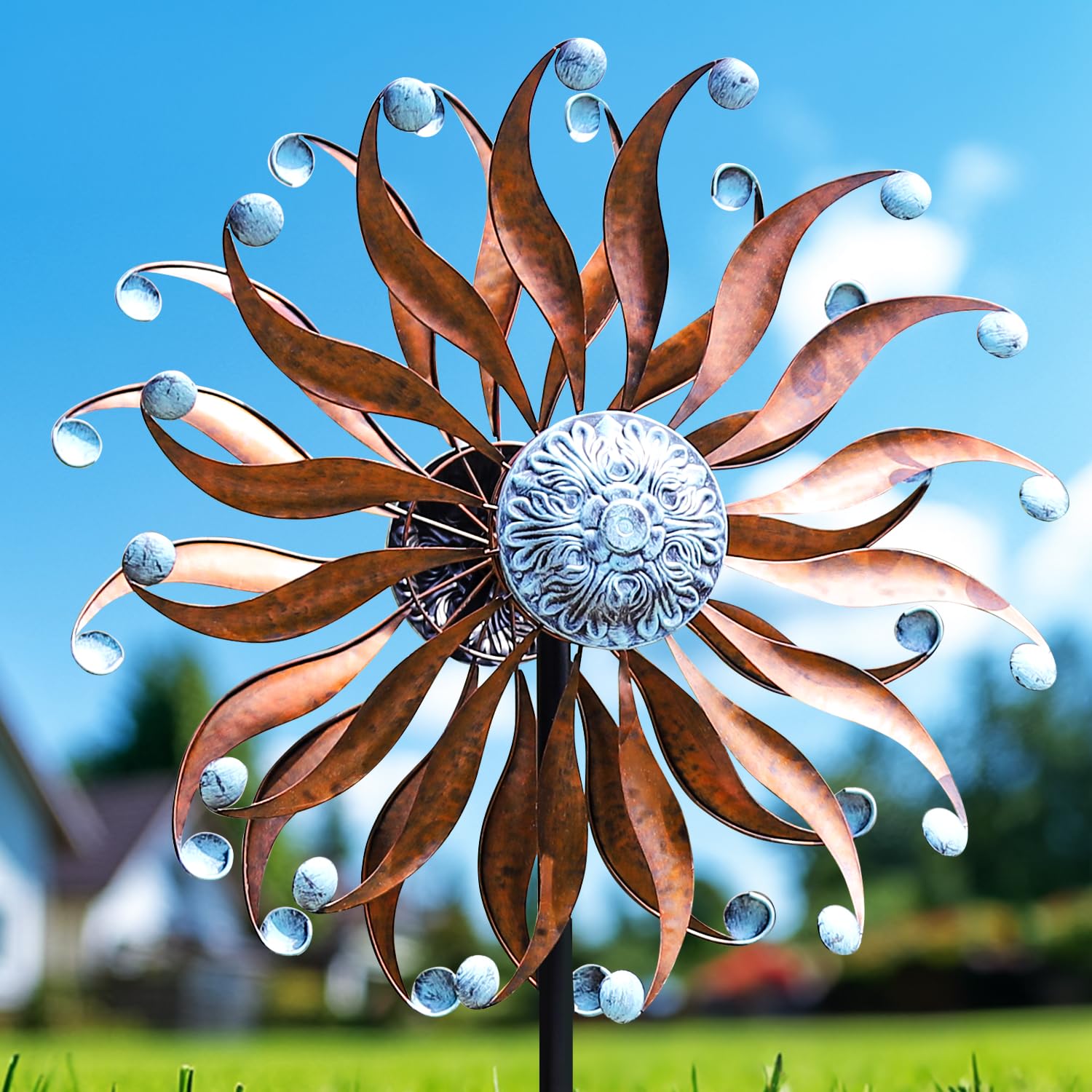 LimeHill Wind Spinner with copper finish on stake adds vibrant yard motion