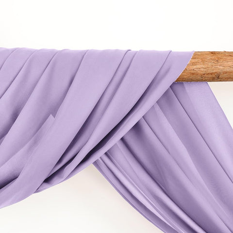 LINXTAR two-panel arch drape provides extended length for flowing cascades.