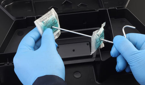 Lipha Tech FirstStrike bait applied directly to a feeding device for efficient placement