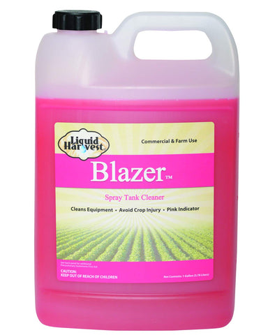 Liquid Harvest Blazer spray tank cleaner bottle pours pink formula for residue-free cleaning.