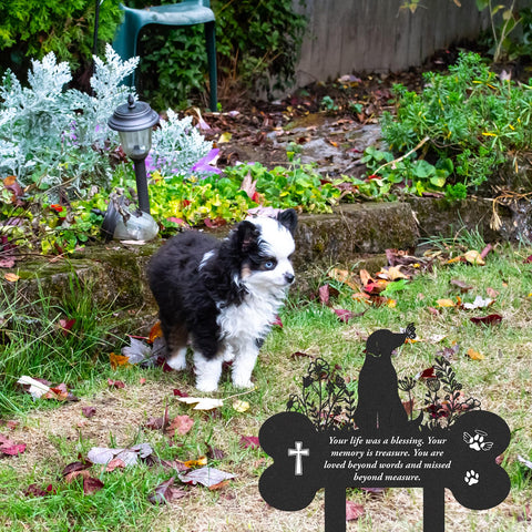 LIRAVENO dog and butterfly remembrance stake in a lawn space